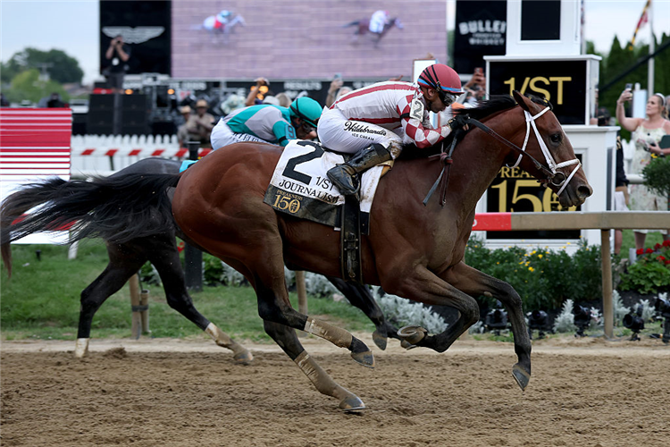 JOURNALISM winning the Preakness Stakes at Pimlico in Baltimore, Maryland.