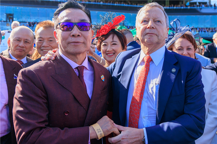 Owner Mr Leung Shek Kong and Mr Winfried Engelbrecht-Bresges, Chief Executive Officer, The Hong Kong Jockey Club watch The Everest.