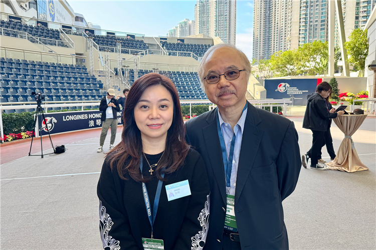 Ada Wong (left) with her father Benedict Wong at the barrier draw for the LONGINES Hong Kong International Races.
