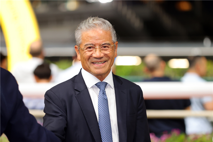 Tony Cruz celebrates a Happy Valley treble