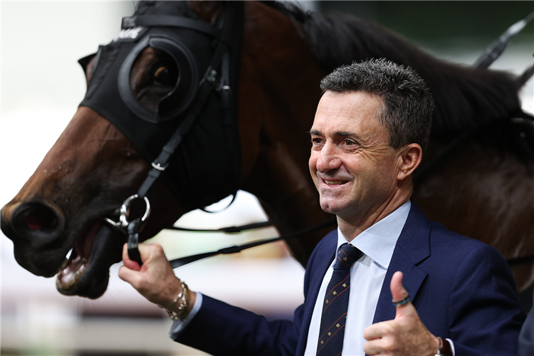 Trainer Douglas Whyte celebrates a double.