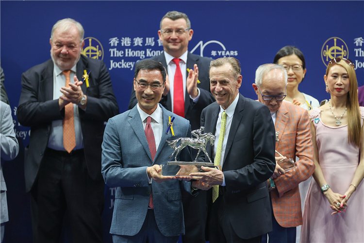 John Size celebrates a record 13th Hong Kong trainers’ championship.