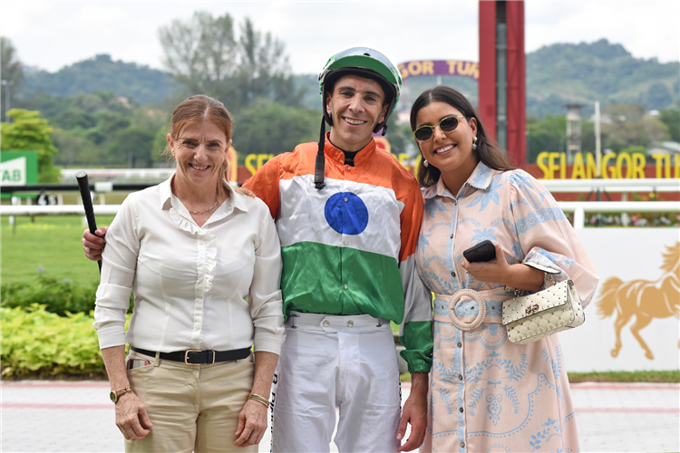 Bernardo Pinheiro celebrates Super Posh’s win with trainer Sharee Hamilton (left) and his wife
