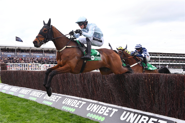 KARGESE winning the Grade 1 Singer Arkle Novice Steeplechase at Cheltenham in England.