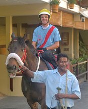 Noel Callow and Snappy at Trackwork in Mauritius<br>Photo by Racing and Sports
