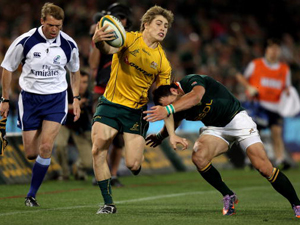 JAMES O'CONNOR the Wallaby wing is tackled by FRANCOIS HOUGAARD during the 2010 Tri-Nations match between the South African Springboks and the Australian Wallabies at Vodacom Park in Bloemfontein, South Africa.