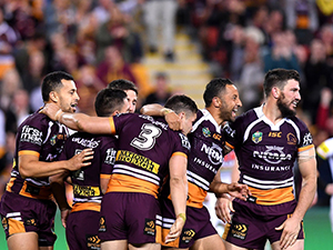 Brisbane Broncos players celebrate scoring a try during their NRL Semi Final against the Penrith Panthers. September 15, 2017