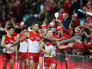 LANCE FRANKLIN of the Swans celebrates with fans after the AFL match between the Sydney Swans and the Essendon Bombers at SCG in Sydney, Australia.