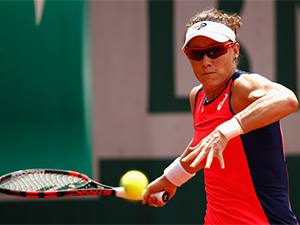 SAMANTHA STOSUR of Australia plays a forehand during the ladies singles match of the 2017 French Open at Roland Garros in Paris, France.