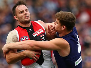 Sean Darcy of the Dockers tackles NATHAN BROWN of the Saints during the AFL match between the Fremantle Dockers and the St Kilda Saints at Domain Stadium in Perth, Australia.