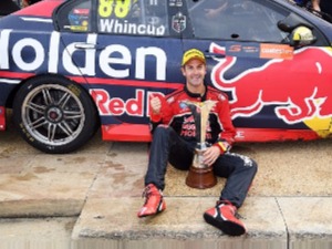 JAMIE WHINCUP driver of the #88 Red Bull Holden Racing Team celebrates after winning the 2017 Supercars Drivers Championship in Newcastle, Australia