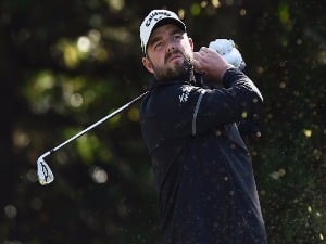 MARC LEISHMAN of Australia hits a tee shot in the final round of the CJ Cup at Nine Bridges in Jeju, South Korea.