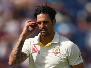 MITCHELL JOHNSON of Australia prepares to bowl during the 1st Investec Ashes Test match in Cardiff, United Kingdom.