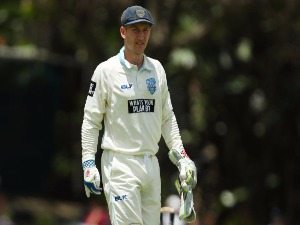 PETER NEVILL of New South Wales looks on during the Sheffield Shield match between Queensland and New South Wales.