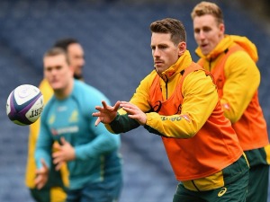 BERNARD FOLEY of Australia passes the ball during the Australia Captain's Run at Murrayfield Stadium in Edinburgh, Scotland.