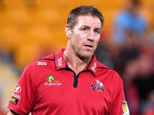 Coach BRAD THORN of the Reds watches on during the Super Rugby match between the Reds and the Bulls at Suncorp Stadium in Brisbane, Australia.