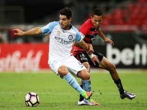 BRUNO FORNAROLI of Melbourne City is challenged by KEARYN BACCUS of the Wanderers during the A-League match between the Western Sydney Wanderers and Melbourne City FC at Spotless Stadium in Sydney, Australia.