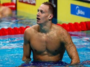 CAELEB REMEL DRESSEL of the US celebrates winning the gold medal during the Men's 100m Butterfly final of the Budapest 2017 FINA World Championships in Budapest, Hungary.