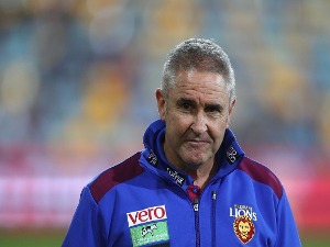 Lions coach CHRIS FAGAN looks on during the AFL match between the Brisbane Lions and the Geelong Cats at The Gabba in Brisbane, Australia.