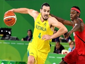 CHRIS GOULDING of Australia takes on the defence during the Basketball match between Australia and Canada of the Gold Coast 2018 Commonwealth Games at Cairns Convention Centre in the Cairns, Australia.