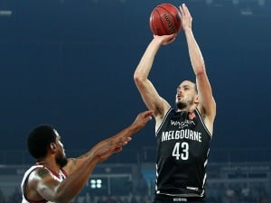 CHRIS GOULDING of Melbourne United (R) shoots during the NBL Grand Final series between Melbourne United and the Adelaide 36ers at Hisense Arena in Melbourne, Australia.