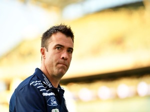 Cats head coach CHRIS SCOTT walks from the field prior to the First AFL Preliminary Final match between the Adelaide Crows and the Geelong Cats at Adelaide Oval in Adelaide, Australia.