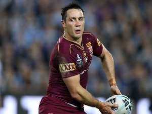 COOPER CRONK of the Maroons passes the ball during the State Of Origin series between the New South Wales Blues and the Queensland Maroons at ANZ Stadium in Sydney, Australia.