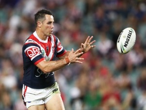 COOPER CRONK of the Roosters catches the ball during the NRL match between the Sydney Roosters and the Canterbury Bulldogs at Allianz Stadium in Sydney, Australia.