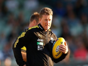 DAMIEN HARDWICK, coach of the Tigers looks on during the AFL JLT Community Series match between the Richmond Tigers and the North Melbourne Kangaroos at Ikon Park in Melbourne, Australia.