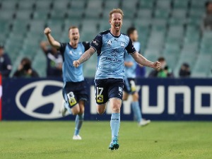 DAVID CARNEY of Sydney FC celebrates an own goal by Terry Antonis of the Victory during the A-League Semi Final match between Sydney FC and Melbourne Victory at Allianz Stadium on in Sydney, Australia.