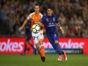 DIMITRI PETRATOS of the Jets and Matthew McKay of the Roar to contest the ball during the A-League match between the Newcastle Jets and the Brisbane Roar at McDonald Jones Stadium in Newcastle, Australia.