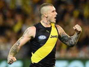 DUSTIN MARTIN of the Tigers celebrates kicking a goal during the AFL match between the Richmond Tigers and the Carlton Blues at MCG in Melbourne, Australia.
