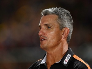Tigers coach IVAN CLEARY looks on before the start of the NRL trial match between the North Queensland Cowboys and the Wests Tigers at Barlow Park in Cairns, Australia.