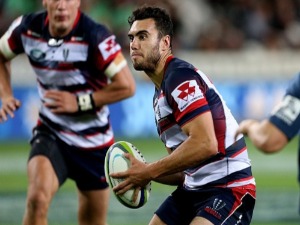 JACK DEBRECZENI of the Rebels looks to pass the ball during the Super Rugby match between the Highlanders and the Rebels at Forsyth Barr Stadium in Dunedin, New Zealand.
