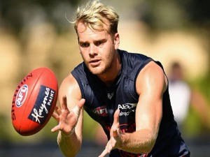 JACK WATTS of the Demons marks during a Melbourne Demons AFL training session at Gosch's Paddock in Melbourne, Australia.
