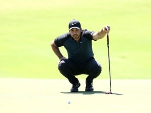 JASON DAY of Australia lines up a putt on the 9th hole during the 2017 Australian Golf Open at the Australian Golf Club in Sydney, Australia.