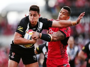 Joseph Tapine of the Kiwis fends against Sika Manu of Tonga during the 2017 Rugby League World Cup match between the New Zealand Kiwis and Tonga. November 11, 2017 in Hamilton, New Zealand.