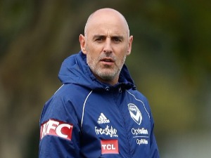 KEVIN MUSCAT, Head Coach of the Victory speaks to his players during a Melbourne Victory A-League training session at Gosch's Paddock in Melbourne, Australia.