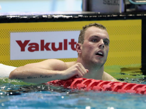 KYLE CHALMERS of Australia celebrates after winning the gold medal after competing in the Men's 100m Freestyle Final of the Pan Pacific Swimming Championships at Tokyo Tatsumi International Swimming Center in Tokyo, Japan.