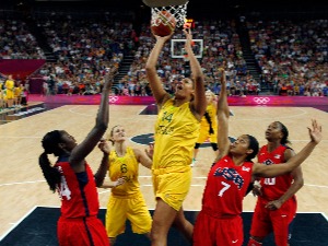 Australia's ELIZABETH CAMBAGE shoots during the women's semifinal basketball game of London 2012 Olympic Games at North Greenwich Arena in London, England.
