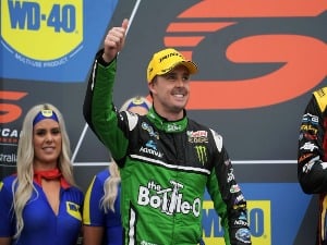MARK WINTERBOTTOM driver of the #5 The Bottle-O Racing Ford Falcon FGX celebrates on the podium the Phillip Island 500, which is part of the Supercars Championship at Phillip Island Grand Prix Circuit in Phillip Island, Australia.