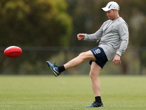 MATTHEW KNIGHTS, Assistant Coach of the Cats kicks the ball during the Geelong Cats training session at Deakin University, Waurn Ponds in Geelong Australia.