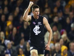MATTHEW KREUZER of the Blues celebrates after kicking a goal during the AFL match between the Carlton Blues and the Hawthorn Hawks at Etihad Stadium in Melbourne, Australia.