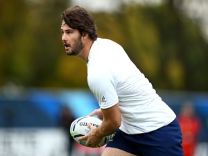 SAM CARTER of Australia runs with the ball during the Australia Captain's Run ahead of the 2015 Rugby World Cup Semi Final against Argentina at The Lensbury Hotel in London, United Kingdom.
