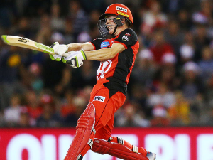 SAM HARPER of the Renegades hits the ball of the Big Bash League match between the Melbourne Renegades and the Perth Scorchers at Marvel Stadium in Melbourne, Australia.