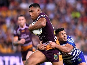 TEVITA PANGAI of the Broncos breaks away from the defence during the NRL match between the Brisbane Broncos and the Canterbury Bulldogs at Suncorp Stadium in Brisbane, Australia.