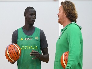 THON MAKER of the Boomers speaks to assistant coach LUC LONGLEY during an Australian Boomers training session at Melbourne Sports and Aquatic Centre in Melbourne, Australia.