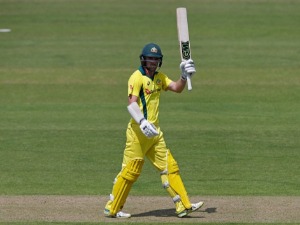TRAVIS HEAD of Australia celebrates his half century during the One Day Tour match between Middlesex and Australia at Lord's Cricket Ground in London, England.