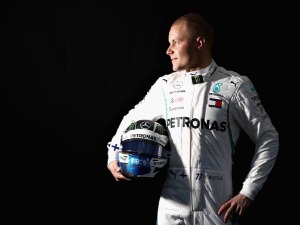 VALTTERI BOTTAS of Finland and Mercedes GP poses for a photo during previews ahead of the Australian Formula One Grand Prix at Albert Park in Melbourne, Australia.