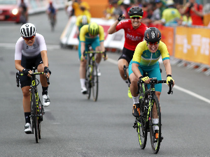 CHLOE HOSKING of Australia leads the field to the finish line during the Women's Road Race of the Gold Coast Commonwealth Games at Currumbin Beachfront in Gold Coast, Australia.
